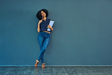 Image showing Thinking, planning and woman on a blue wall for business, career ideas or plan in an office. Smile, corporate and a young female employee with a notebook and idea or professional strategy with mockup