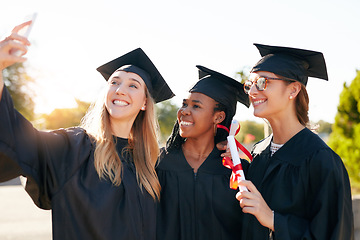 Image showing Women, friends and graduation selfie for college or university students together with a smile. Happy people outdoor to celebrate education achievement, success or future at event for school graduates