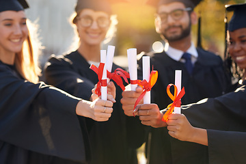 Image showing Group, students and graduation diploma with friends hands of college or university people. Men and women outdoor to celebrate education achievement, success and certificate at school for graduates