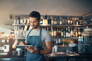Image showing Man in restaurant, tablet and inventory check, small business and entrepreneur in hospitality industry. Male owner, scroll and cafe franchise, digital admin and stock taking with connectivity