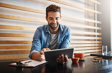 Image showing Online, typing and a man with a tablet at a cafe for communication, connectivity and administration. Happy, remote work and a male entrepreneur reading from the web with technology at a coffee shop