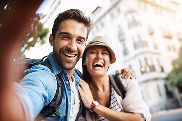 Image showing Tourist, selfie and happy couple for travel on city street for holiday memory and happiness. Face of man and woman outdoor for outdoor adventure, journey or vacation for freedom or funny portrait