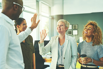 Image showing High five, happy and motivation with business people in office for success, winner and agreement. Support, goals and target with group of employees for teamwork, collaboration and solidarity