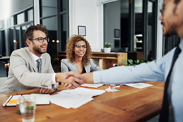 Image showing Professional, handshake and welcome an employee for discussion about collaboration at the office. Employer, interview and smile with businessman to shake hand for contract agreement during deal.