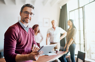 Image showing Portrait, man on tablet and web design meeting with team in creative office workspace and planning, research and management. Businessman, happy teamwork and leader working with technology for project