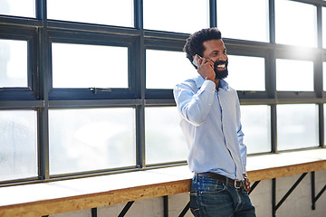 Image showing Window, phone call and smile with a business man in the office for communication, networking or negotiation. Happy, vision and mobile with a male employee talking in the workplace during his break