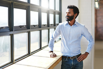 Image showing Window, flare and thinking with a business in the office to focus on future success or company vision. Idea, mindset and corporate with a male employee standing in the workplace during his break