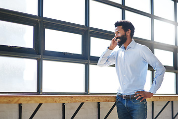 Image showing Window, phone call and a happy business man thinking in the office with a smile or mindset of future success. Idea, vision and communication with a male employee talking at work during his break