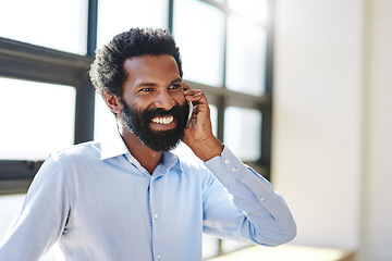 Image showing Thinking, smile and phone call with a business man at work for communication or negotiation. Idea, mobile contact and chatting with a happy male employee networking in the workplace during his break