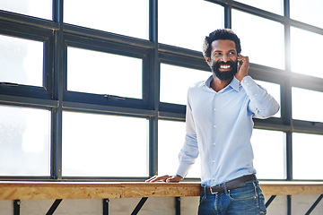 Image showing Window, phone call and communication with a happy business man in the office with a smile or mindset of the future. Happy, mobile and contact with a male employee talking at work during his break