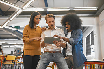 Image showing Business people, startup group and tablet with talk, planning and brainstorming together in modern office. Leader man, touchscreen and teamwork for reading, focus or consulting at web design company