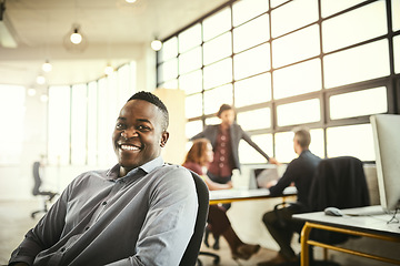 Image showing Smile, boss and portrait of black man at office, startup entrepreneur with creative ideas for business project. Leader with creativity, ideas and African businessman with pride in designer workspace.