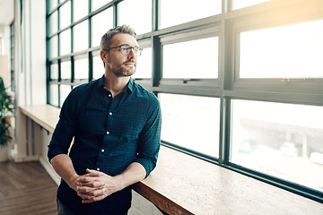 Image showing Thinking, ideas and man at office window, creative business project or entrepreneur at design agency. Confident boss with vision and idea at startup, businessman with future plan in workspace