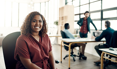 Image showing Portrait, happy woman in chair and boss at creative startup, leader in business project at design agency. Proud entrepreneur with creativity, idea and happiness, female ceo in happy African workplace