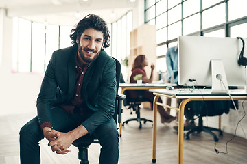 Image showing Portrait, confidence and happy man in chair at coworking space, ideas for project and entrepreneur at design agency. Leader in creativity, idea and happiness, businessman with creative plan in office