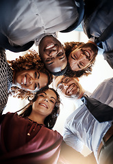 Image showing Business people, happy group and portrait in a huddle for teamwork, collaboration or team building. Face of diversity men and women together for support, solidarity and trust or motivation from below
