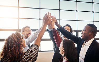 Image showing High five, business people and group together for teamwork, collaboration or team building in office. Hands of diversity men and women for corporate support, solidarity and mission or motivation