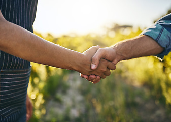 Image showing Farmer teamwork, handshake and success for sustainability deal in the countryside on farm. Agriculture, thank you and collaboration agreement in nature with farming worker and sustainable business