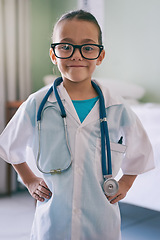 Image showing Girl child, portrait and play doctor with smile, glasses and stethoscope in home, hospital or clinic. Female kid, playing medic and happy with excited face, learning and game for development in house