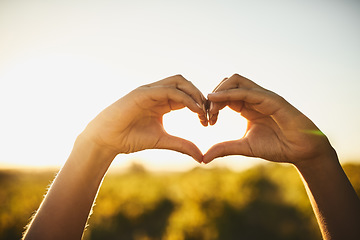 Image showing Woman with love hand sign, nature and sunshine, sustainability and eco friendly earth care and natural farm landscape. Conservation, sustainable agro farming and heart hands, emoji and green fingers.