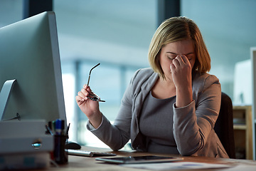 Image showing Stress, headache and business woman in office, tired or fatigue while working late at night on computer. Burnout, migraine and female person with depression, anxiety or brain fog, pain and sick.