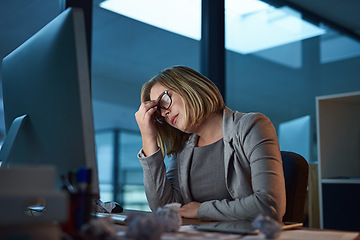 Image showing Stress, headache and business woman in office, tired or fatigue while working late at night on computer. Burnout, migraine and female person with depression, anxiety or brain fog, sick and deadline.