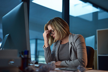 Image showing Headache, burnout and business woman in office, tired or fatigue while working late at night on computer. Stress, migraine and female person with depression, anxiety or brain fog, sick and deadline.