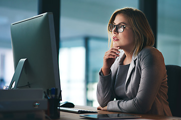 Image showing Computer, problem solving and business woman in office working late on project at night alone. Desktop, professional and female person thinking, focus or solution, planning and reading on deadline.