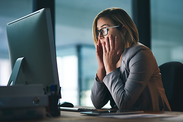 Image showing Stress, headache and business woman in office, tired or fatigue while working late at night on computer. Burnout, deadline and female person with depression, anxiety or brain fog, sick or exhausted.