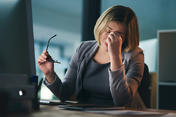 Image showing Pain, headache and business woman in office, tired or fatigue while working late at night on computer. Burnout, migraine and female person with depression, anxiety or brain fog, stress and deadline.