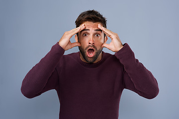 Image showing Portrait, wow and man in studio mind blown by gossip, drama or secret against grey background. Omg, face and surprised male with wtf expression for fake news, announcement and rumor while isolated