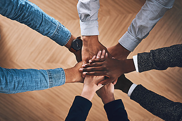 Image showing Diversity, faith or hands of business people in support for love, teamwork or community strategy in office. Closeup, above or employees in group collaboration with hope or mission for goals together