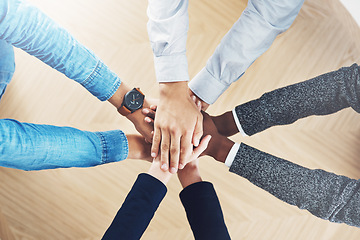 Image showing Plan, mission or hands of business people in support for faith, teamwork or partnership in office. Diversity or above of employees in group collaboration with hope or strategy for goals together