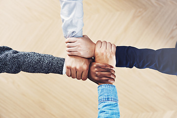 Image showing Team building, link or hands of business people with diversity for community support or teamwork in office. Zoom, above or group of employees with joint mission, trust or hope for goals together