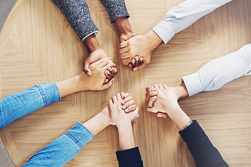 Image showing Above, teamwork or business people holding hands for support, team building or community in office. Motivation, trust or employees in group collaboration with diversity or mission for goals together