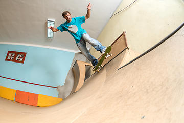 Image showing Skateboarder performing a trick