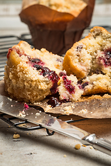 Image showing Muffins with red fruits jam fill.