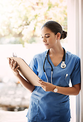 Image showing Woman doctor, clipboard and check notes for medical service, hospital documents and nursing registration or information. Report, analysis and professional nurse or healthcare person with checklist