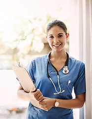 Image showing Woman doctor, clipboard and portrait for medical service, hospital documents and nursing registration or information. Face, smile and professional doctor or healthcare person, checklist and clinic