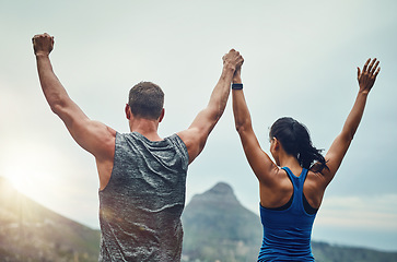 Image showing Couple, celebration and arms up in nature for training, workout or exercise to run a marathon, competition or tournament. People, winning and happy for freedom, sports goal or achievement