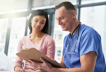 Image showing Medical, consulting and doctor with patient and checklist for advice, questions or research. Medicine, healthcare and documents with man and woman with paperwork for planning, information or wellness