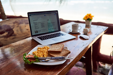 Image showing Cafe food, laptop or breakfast by a beach for remote workspace in the morning with connection. Desk, seaside restaurant or table in coffee shop for digital blog online with brunch meal or lunch