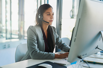 Image showing Call center, computer and consulting with woman in office for customer support, advisory and online. Technology, internet and receptionist with employee at desk for contact us, communication and crm