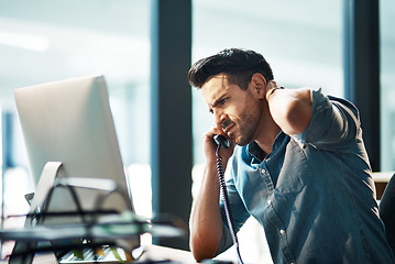 Image showing Business man, telephone call and stress in office for mistake, problem and anxiety for failure, bad news and crisis at computer. Frustrated worker, worry and talking on phone with fatigue of burnout