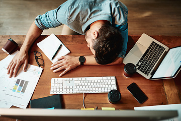 Image showing Top view, tired man and sleeping at desk in office with burnout, bored and stress. Fatigue, lazy and overworked business employee taking nap at table for frustrated deadline, depression or low energy