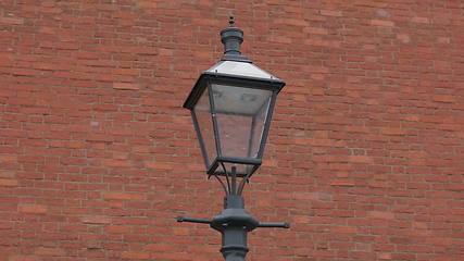 Image showing lantern on a background of ancient brick walls of the Kremlin