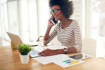 Image showing Phone call, laptop and black woman accountant talking financial company or startup strategy in home office. Cellphone, happy and entrepreneur or employee planning graph results doing remote work