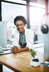 Image showing Employee, portrait and black woman with a smile, office and computer with development, career and professional. Face, female person and consultant with startup success, technology and confidence