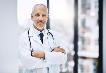 Image showing Healthcare, confidence and portrait of senior doctor with pride in hospital for support in clinic. Health care boss, happiness and medicine, confident and happy man, medical professional with smile.