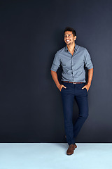 Image showing Happy, fashion and space with business man in studio for professional, mission and mockup. Pride, mindset and expert with male employee on dark background for entrepreneur, happiness and style